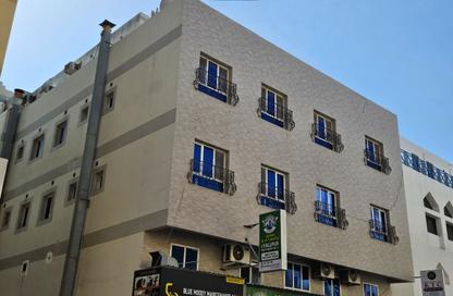 عمارة بالكامل - 2 - 2 للبيع في القضيبية - المنامة - محافظة العاصمة