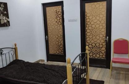 عمارة بالكامل - استوديو - 2 حمامات للبيع في المحرق - المحرق